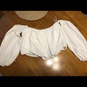 Off the shoulder white blouse.